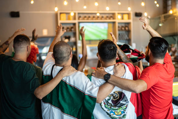 Mexican fans celebrating a goal in soccer game
